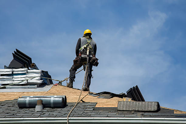 Professional Roofing technician working in Peconic, NY